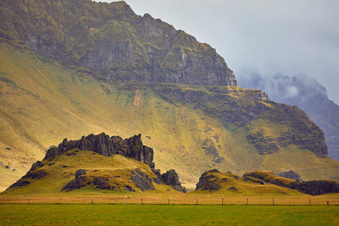 Rugged cliffs and rocky terrain near Seljalandsfoss Falls in Southern Iceland; Iceland