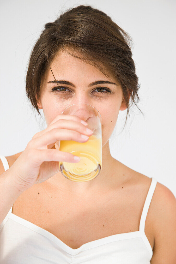 Woman Drinking Orange Juice