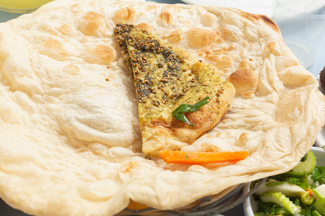 Still life close up baked Israeli laffa flatbread with zaatar
