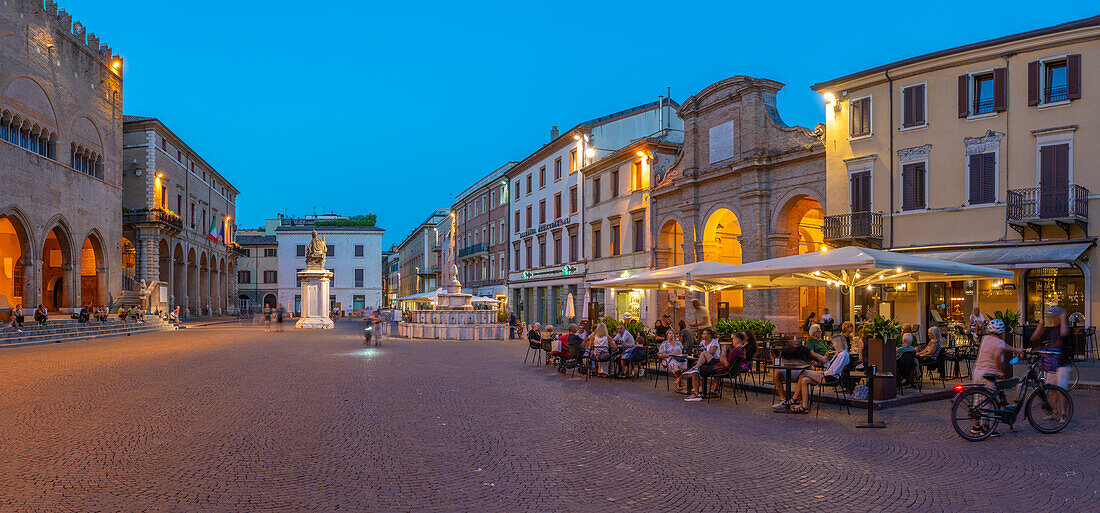 View of restaurant in Piazza Cavour in Rimini at dusk, Rimini, Emilia-Romagna, Italy, Europe