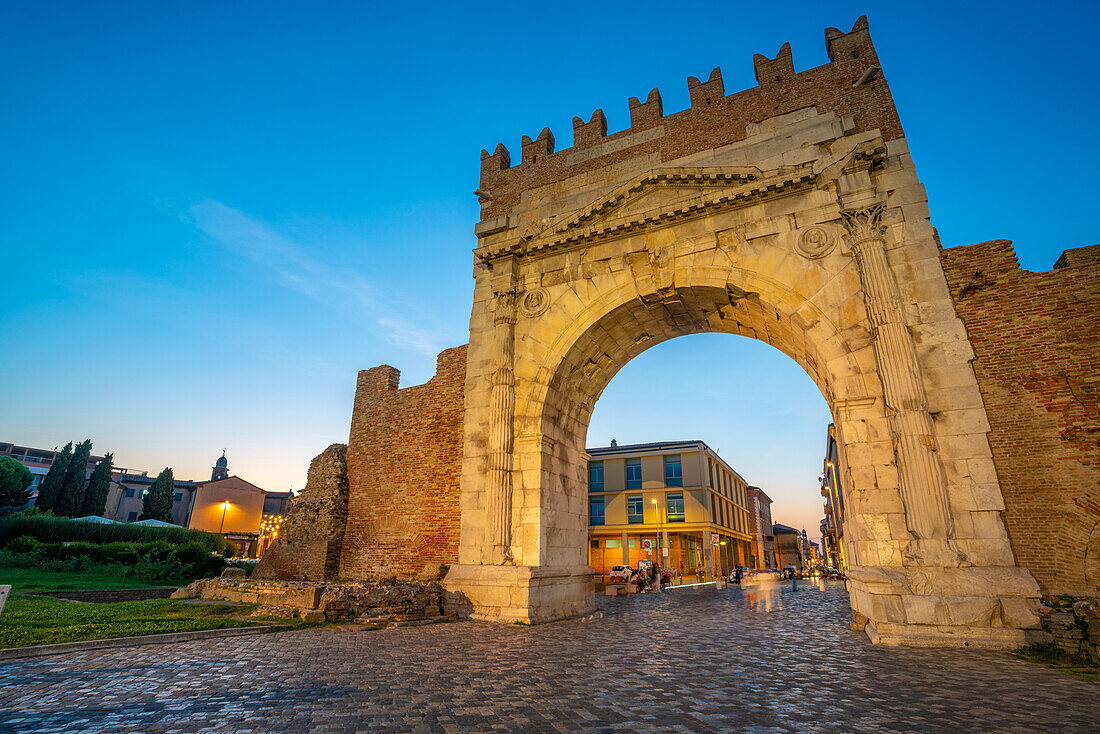 View of Arch of Augustus (Arco d'Augusto) at dusk, Rimini, Emilia-Romagna, Italy, Europe