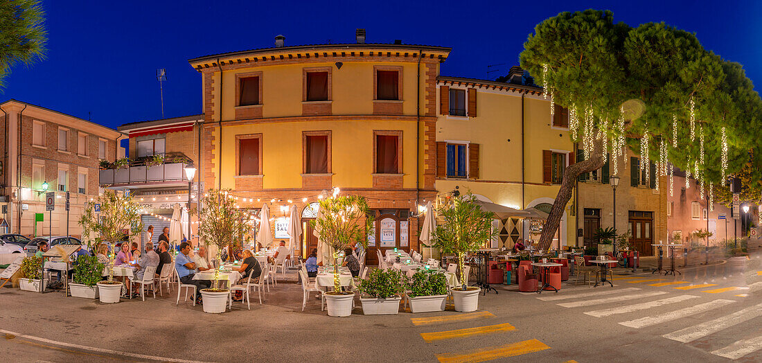 View of cafe in Borgo San Giuliano district in Rimini at dusk, Rimini, Emilia-Romagna, Italy, Europe