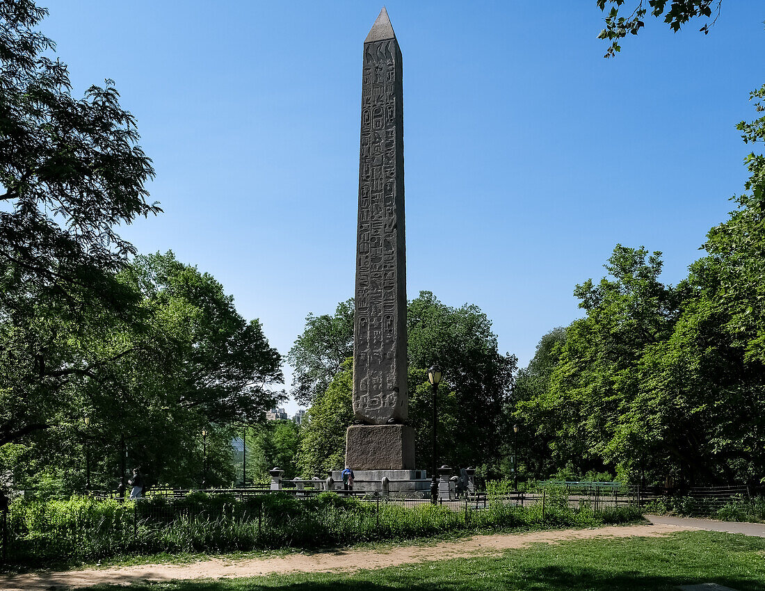 View of Cleopatra's Needle, a red granite obelisk, from the Temple of Ra in Ancient Egypt, Central Park, New York City, United States of America, North America