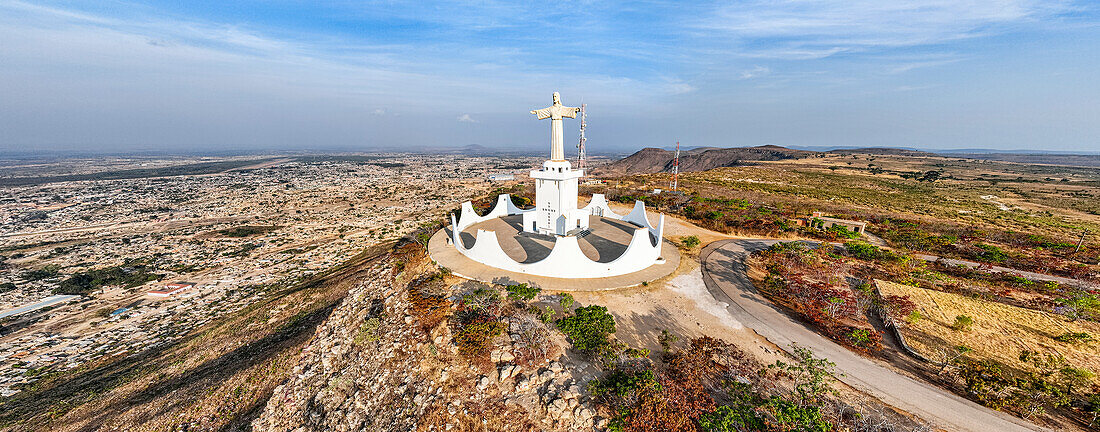 Aerial of the Christ the King Statue, overlooking Lubango, Angola, Africa