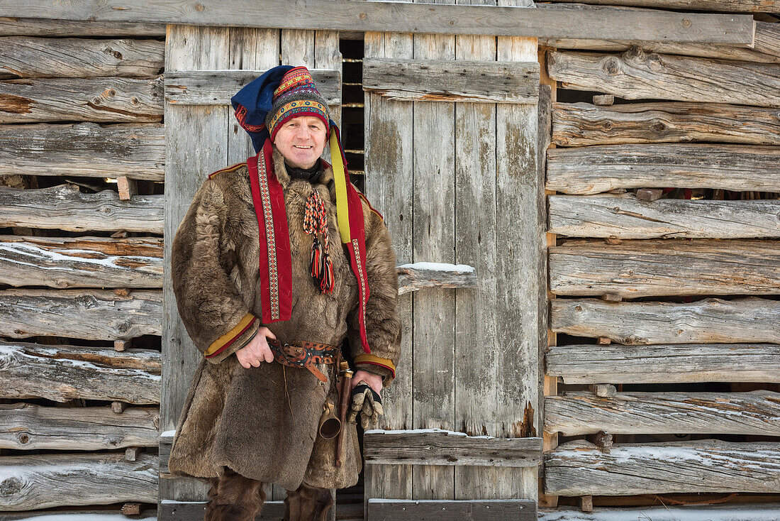 Sami man in traditional dress, Finland, Europe