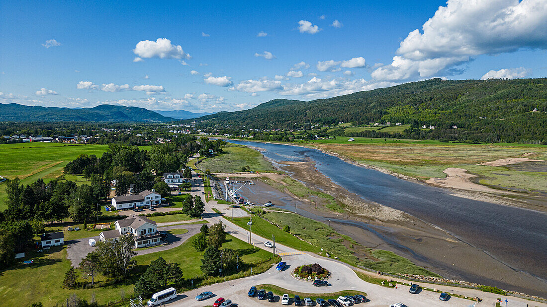 Aerial of the Gouffre River flowing in the St. Lawrence River, Quebec, Canada, North America