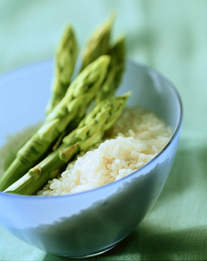 Green asparagus and rice in bowl