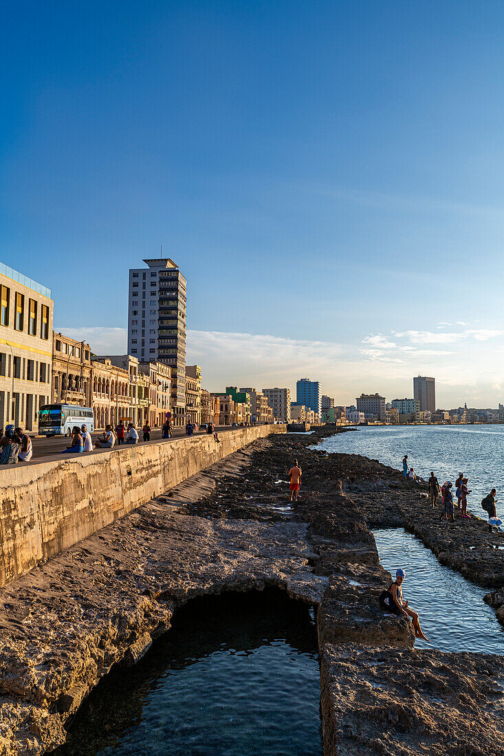 Sunset at the Malecon promenade, Havana, Cuba, West Indies, Central America