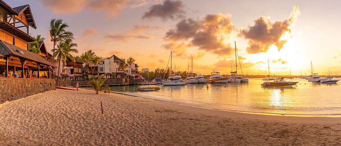 View of beach and boats in Grand Bay at golden hour, Mauritius, Indian Ocean, Africa