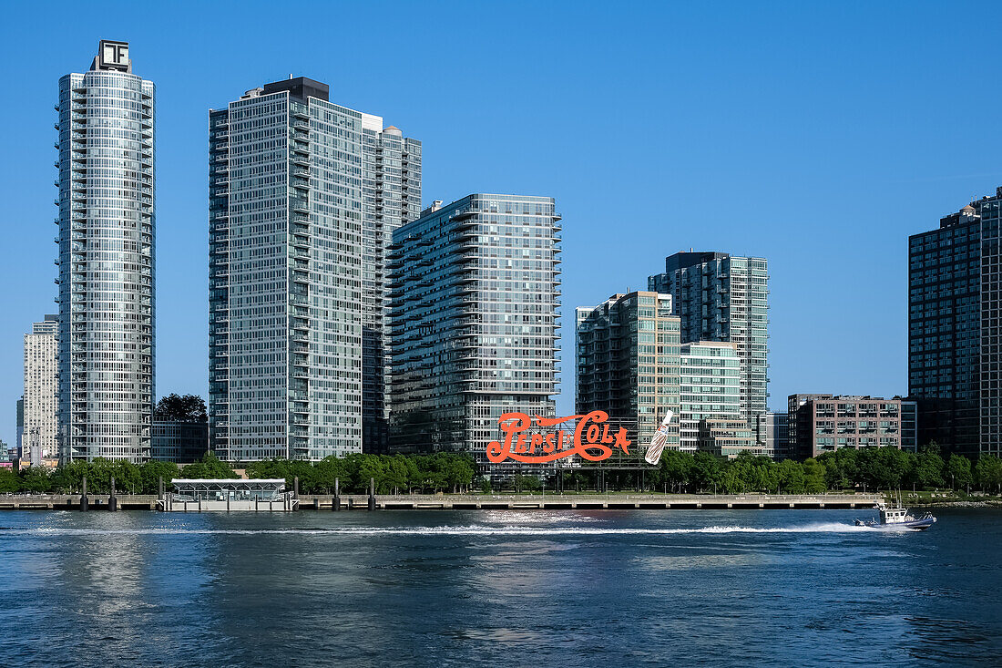 The Pepsi-Cola sign, built in 1940, a neon sign at Gantry Plaza State Park in the Long Island City neighborhood of Queens, visible fromManhattan the East East River, New York City, United States of America, North America