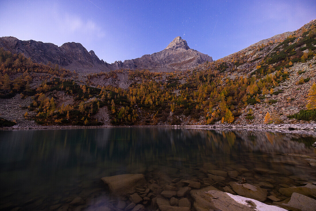 Braccia mountain at Lagazzuolo lake at sunrise in autumn, Chiesa di Valmalenco, Sondrio, Lombardy, Italy, Europe