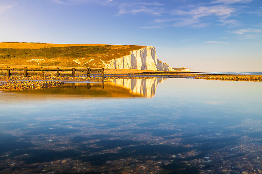 Seven Sisters chalk cliffs at sunset, South Downs National Park, East Sussex, England, United Kingdom, Europe