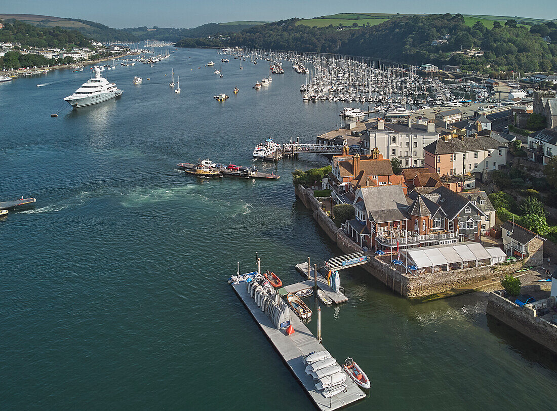 An aerial view of the estuary of the River Dart, with the towns of Dartmouth on the left and Kingswear on the right, on the south coast of Devon, England, United Kingdom, Europe