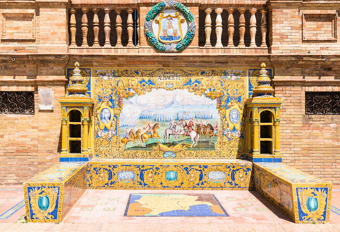 One of the 48 tiled Provincial Alcoves along the walls of the Plaza de Espana (Spain Square) in Parque de Maria Luisa (Maria Luisa Park), Seville, Andalusia, Spain, Europe