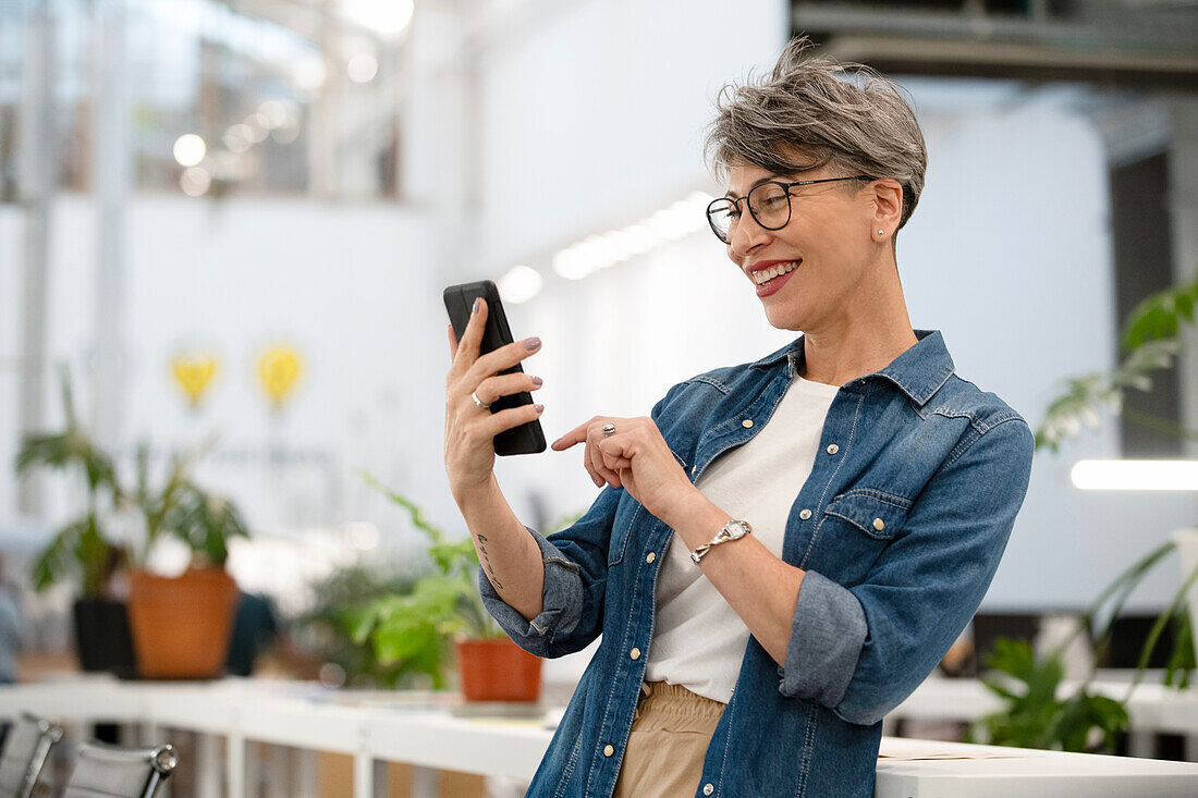 Female entrepreneur having a video call on smart phone