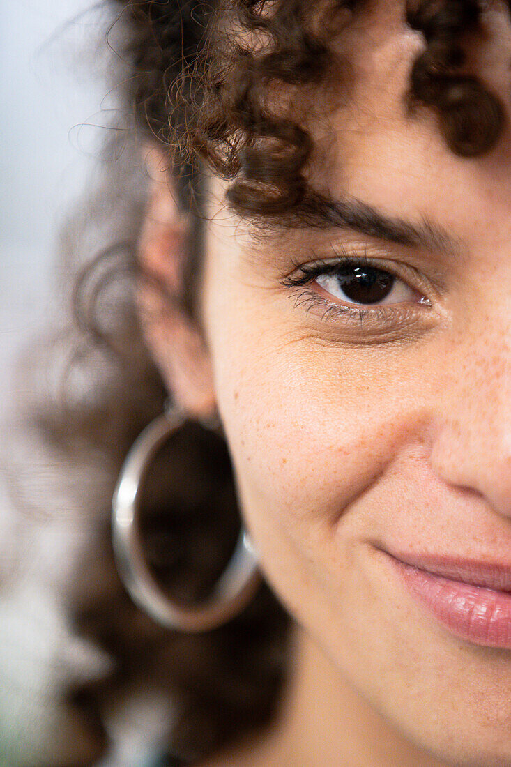 Half face portrait of Latin American woman's face