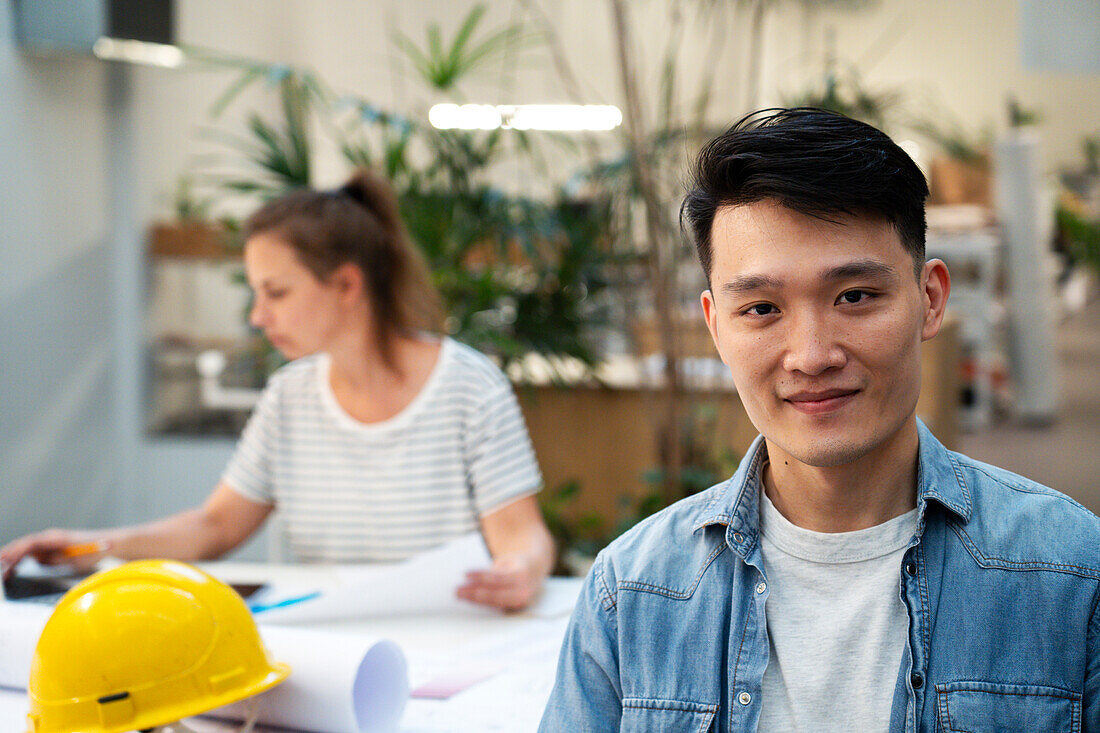 Young adult engineer looking at the camera