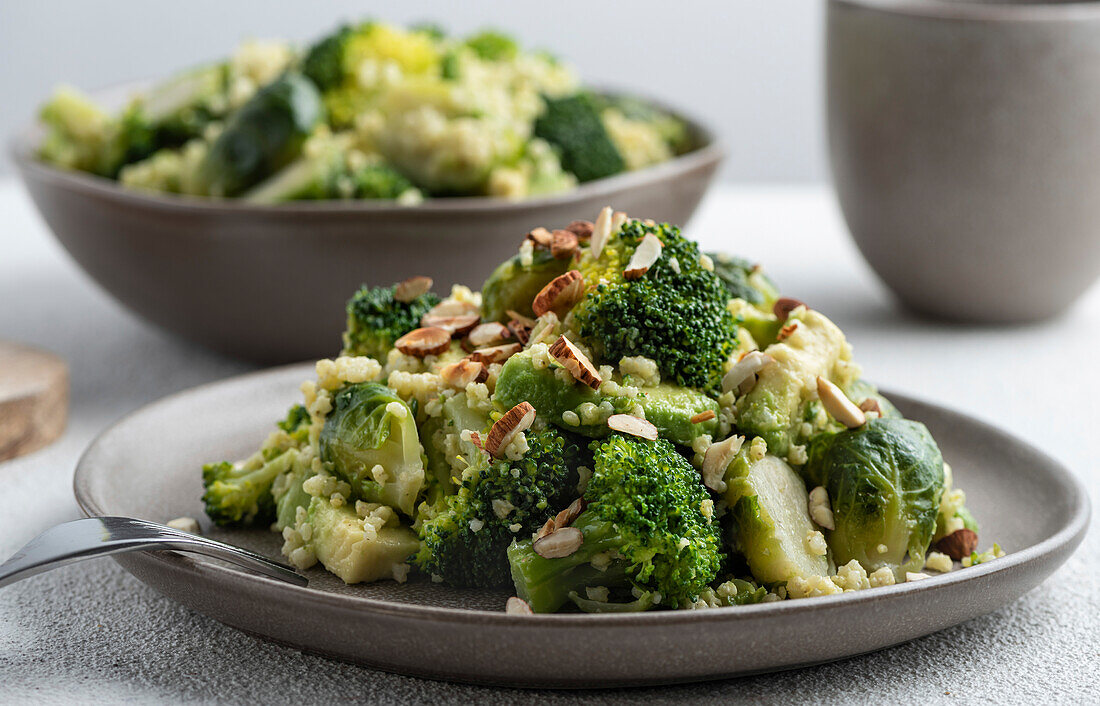 The warm salad of broccoli, Brussels sprouts and avocado with almonds.