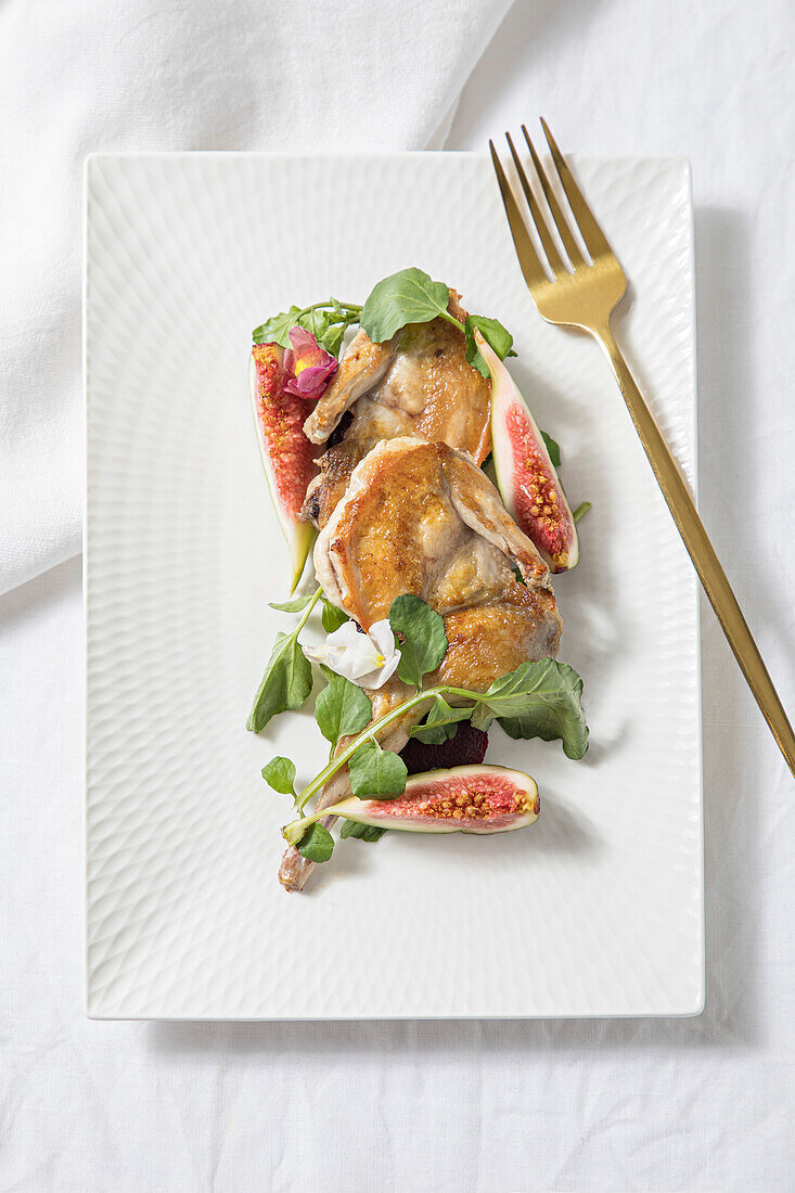 Roast quail with fig and port wine reduction