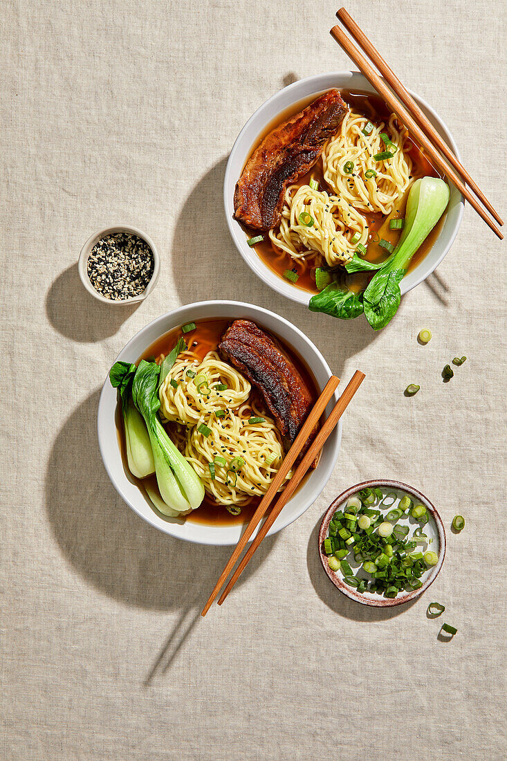 Ramen, Pork Belly and Bok Choy with a Light Neutral Background