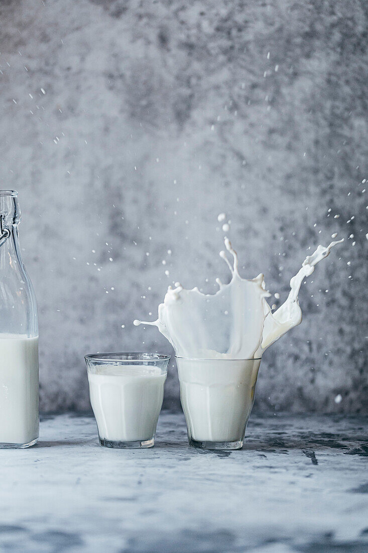 Plant-based milk is poured into a glass