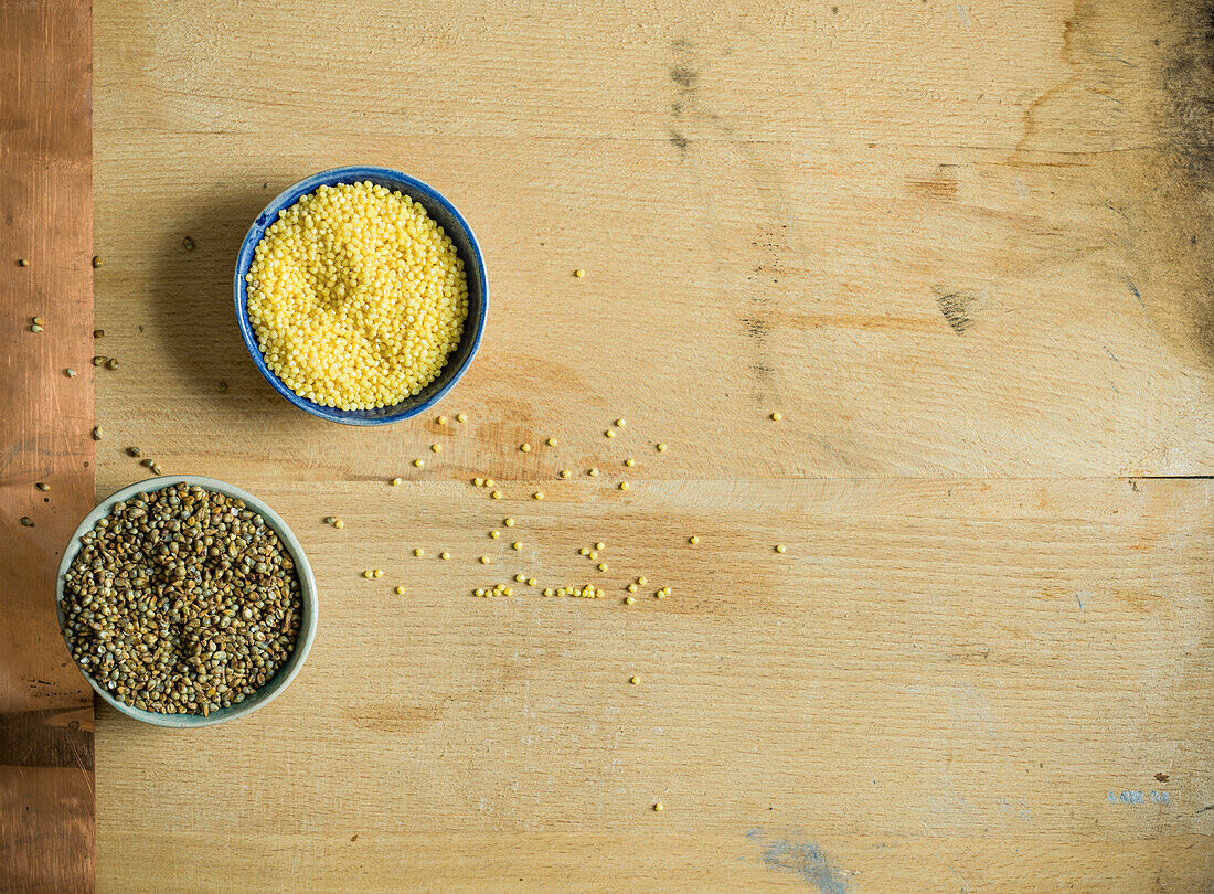 Pearl and foxtail millet on wood