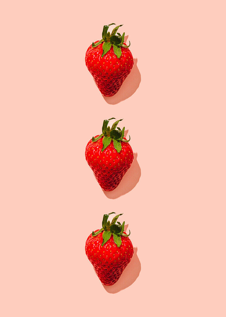 Strawberry pattern on a pink background
