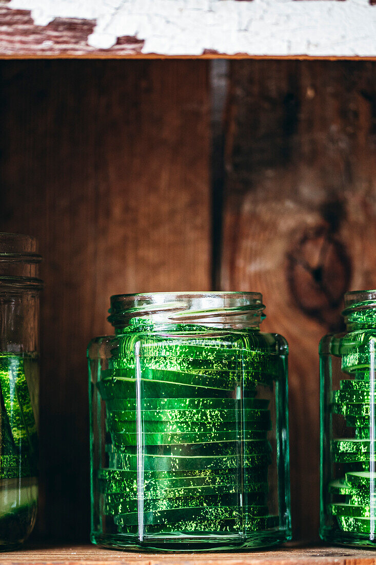 Freshly sliced cucumbers in a jar