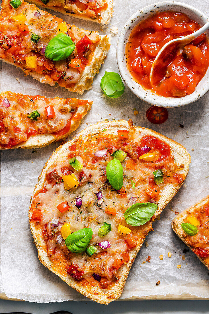 Cheese and tomato bread pizzas