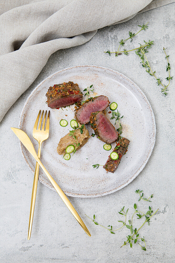 Lamb belly, peas, with herb crusted roast potato puree.