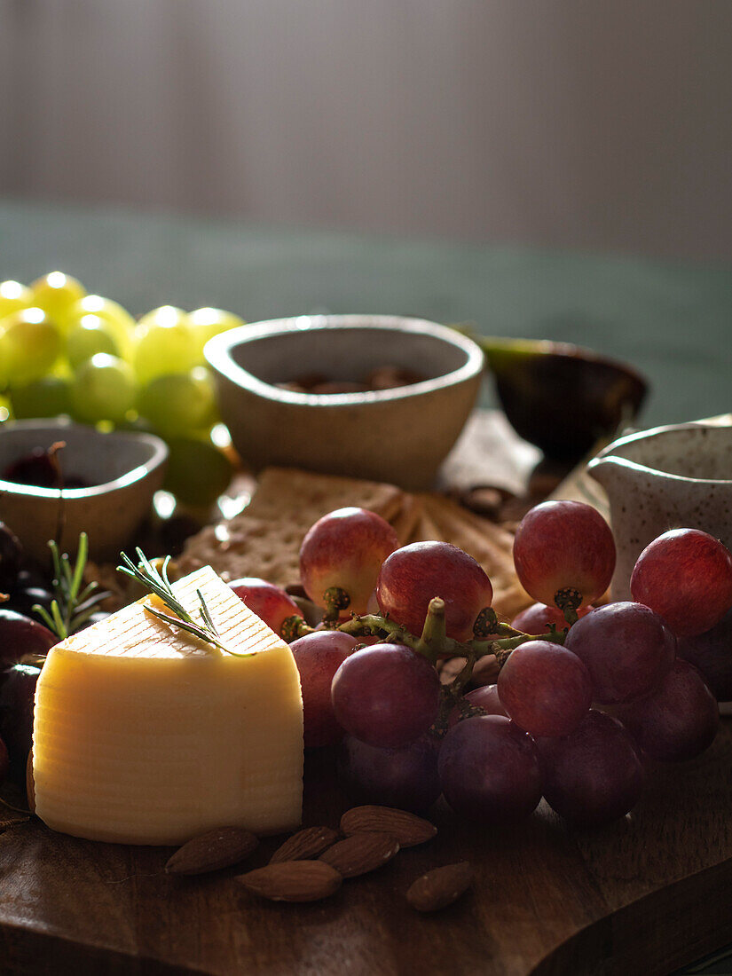 Cheese board in shades of green with beautiful mystical light