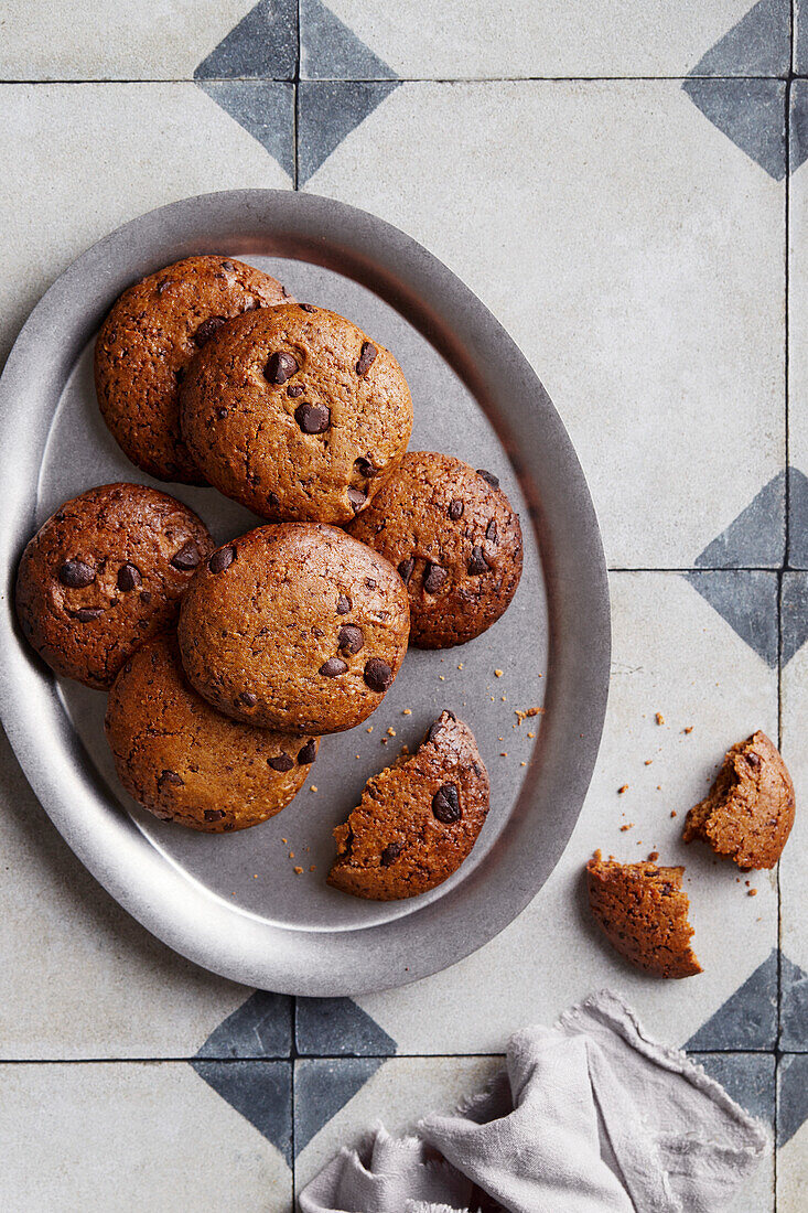 Soft chocolate biscuits on a silver tray