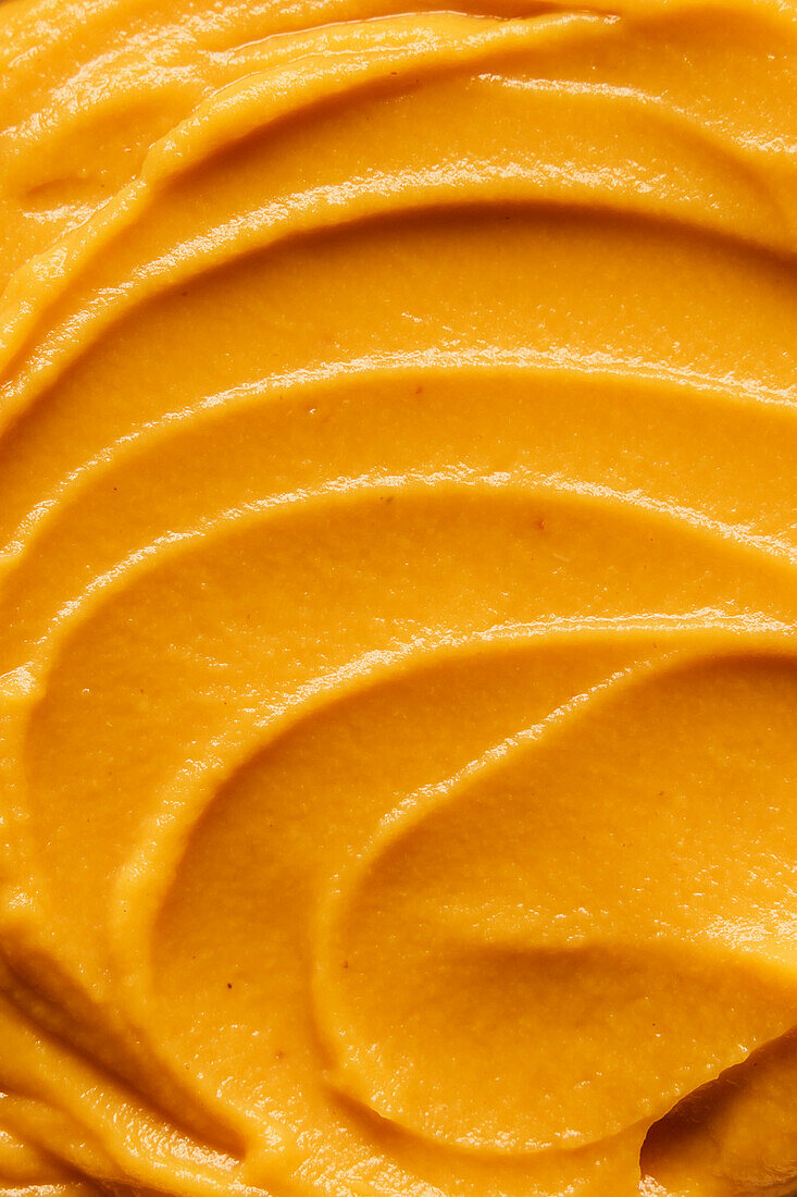 Swirl of pumpkin puree close-up