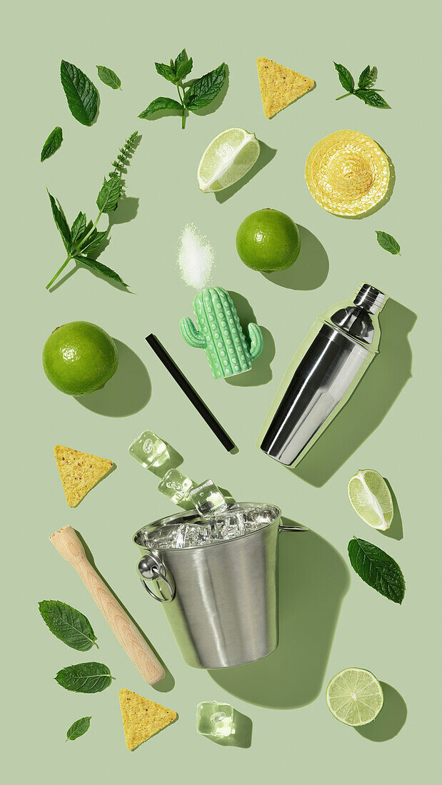 Mojito cocktail concept. Mojito ingredients and cocktail accessories flat lay top view Mexican food and drink