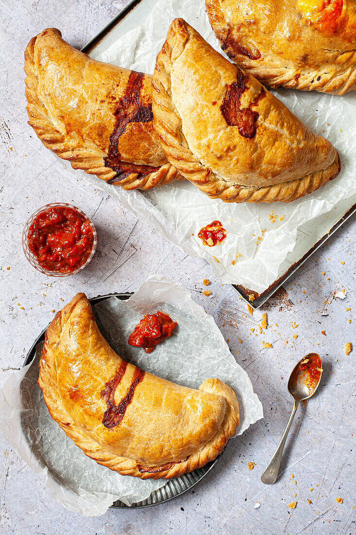 Vegetarian dumplings are served with tomato chutney