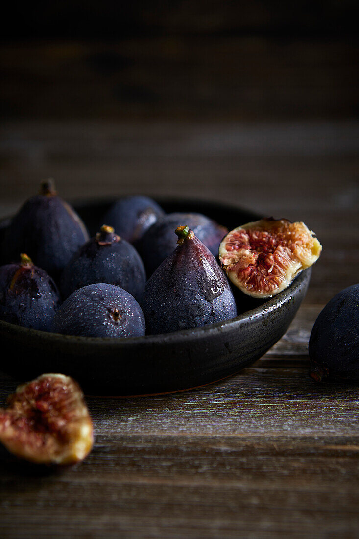 Figs on a dark rustic background