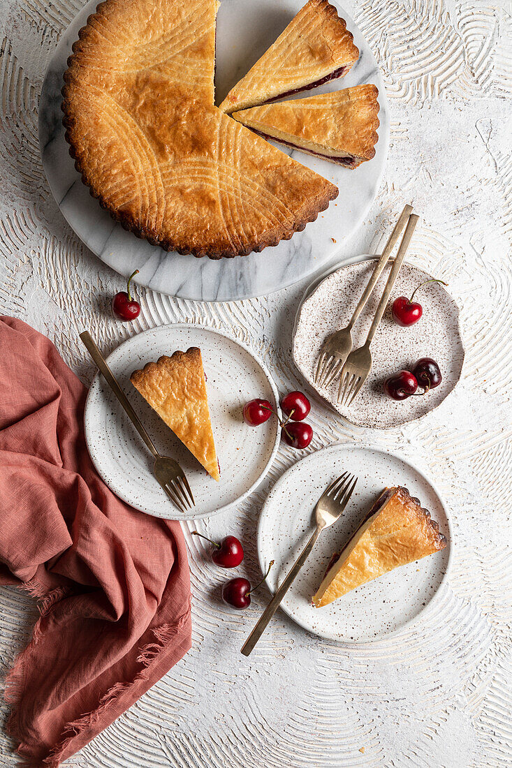 Basque tart with custard and cherry compote