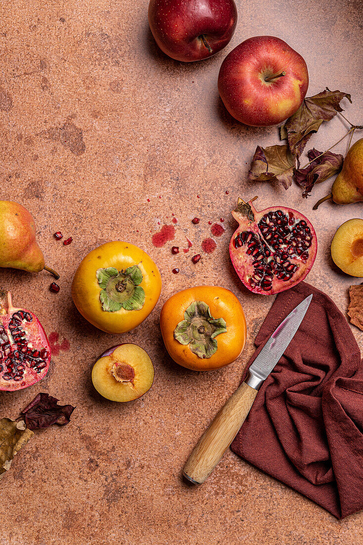 Flatlay of autumn fruits in soft light