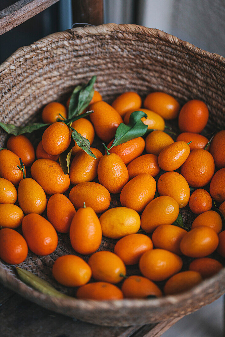 Fresh kumquats in a basket