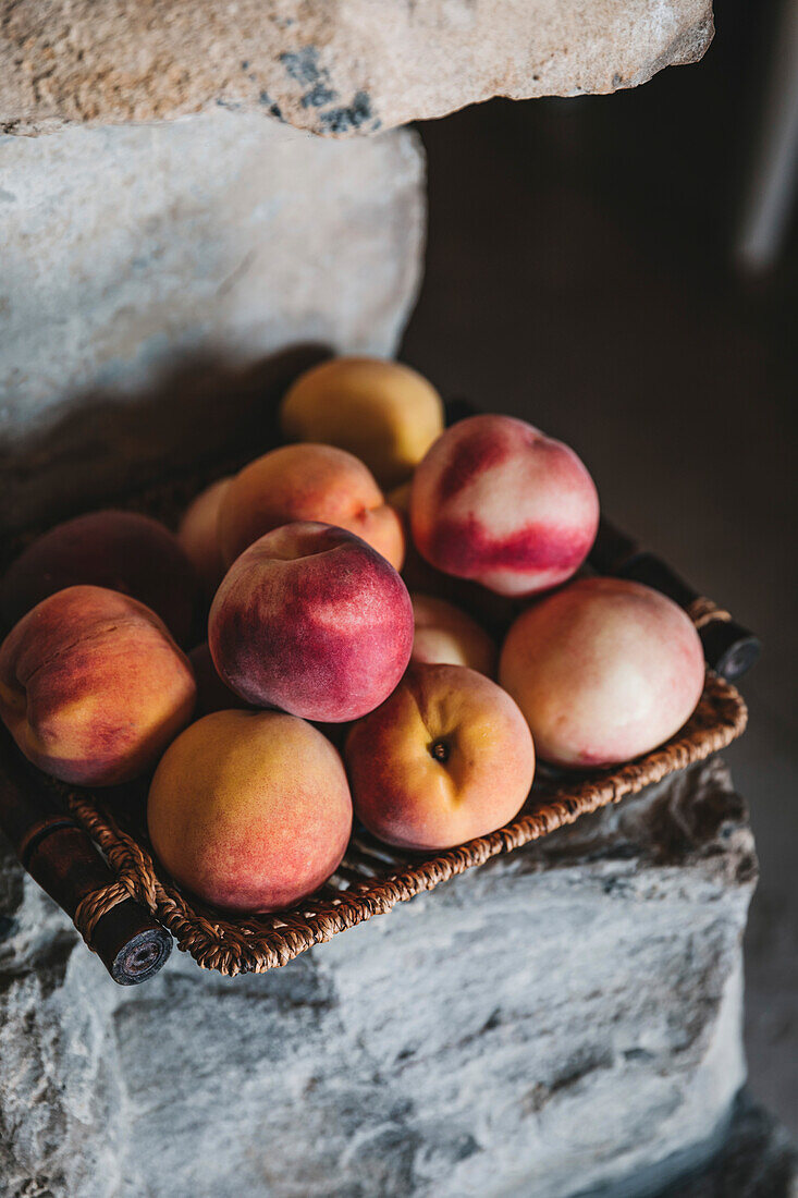 Fresh ripe nectarines in a basket