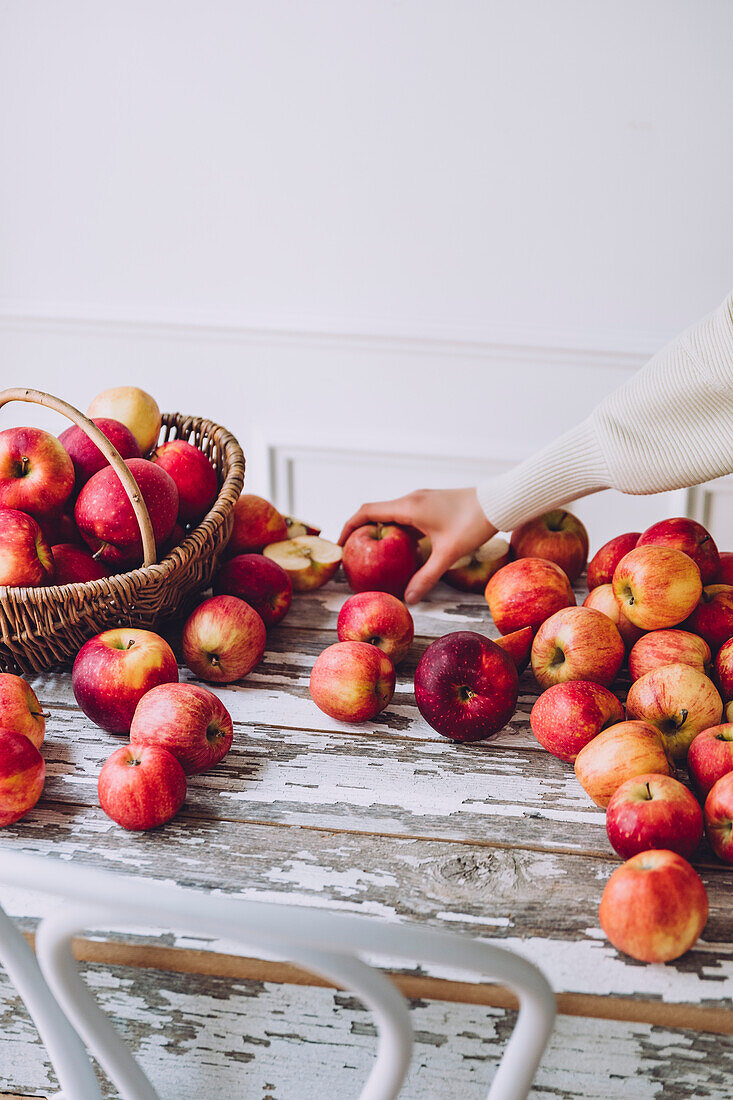 Apples in a basket against a white background