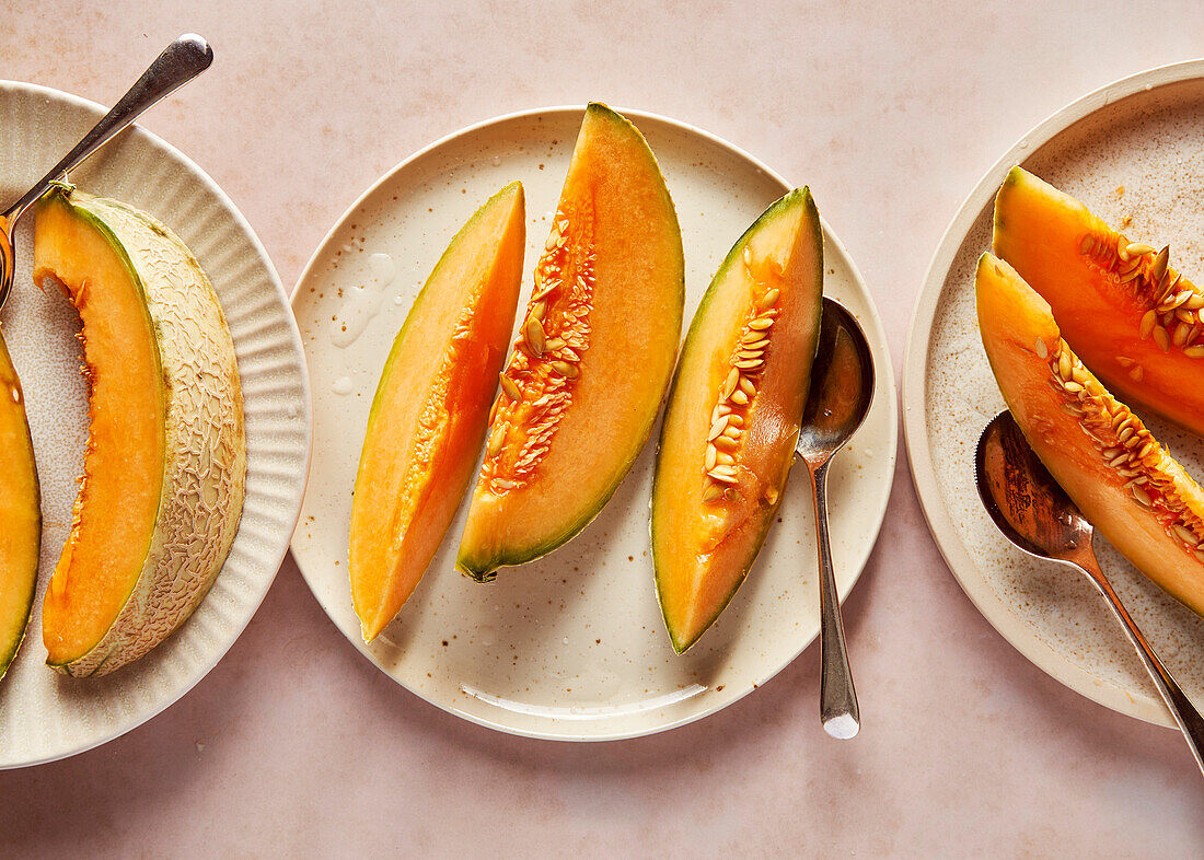 Cantaloupe melon slices on plates