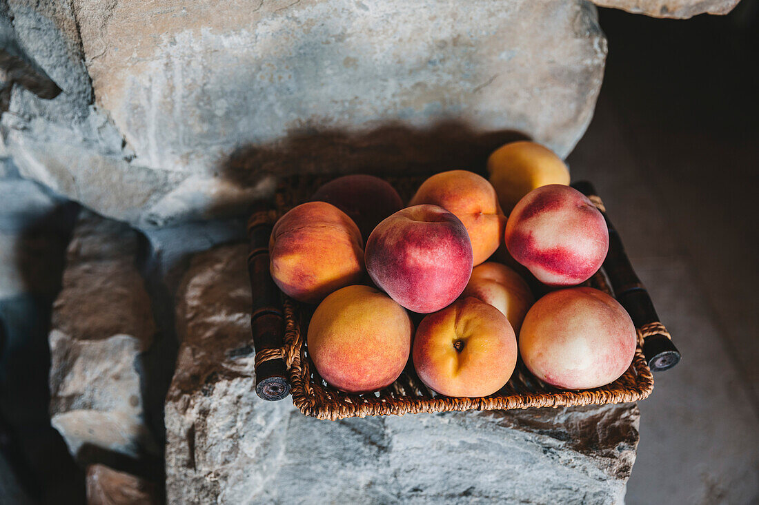 Fresh ripe nectarines in a basket