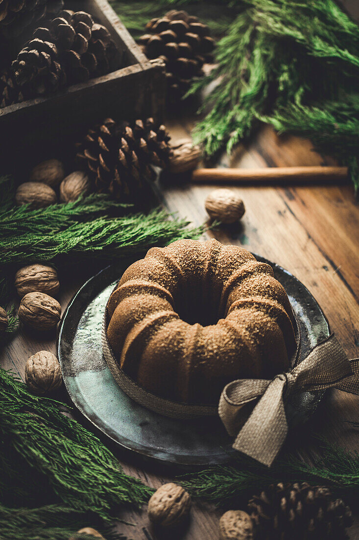 Christmas cake. Bundt cake on a wooden table