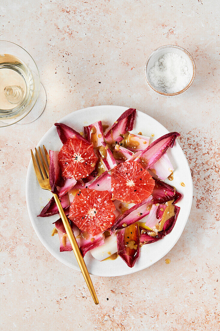 Endive and grapefruit salad with mustard dressing and white wine
