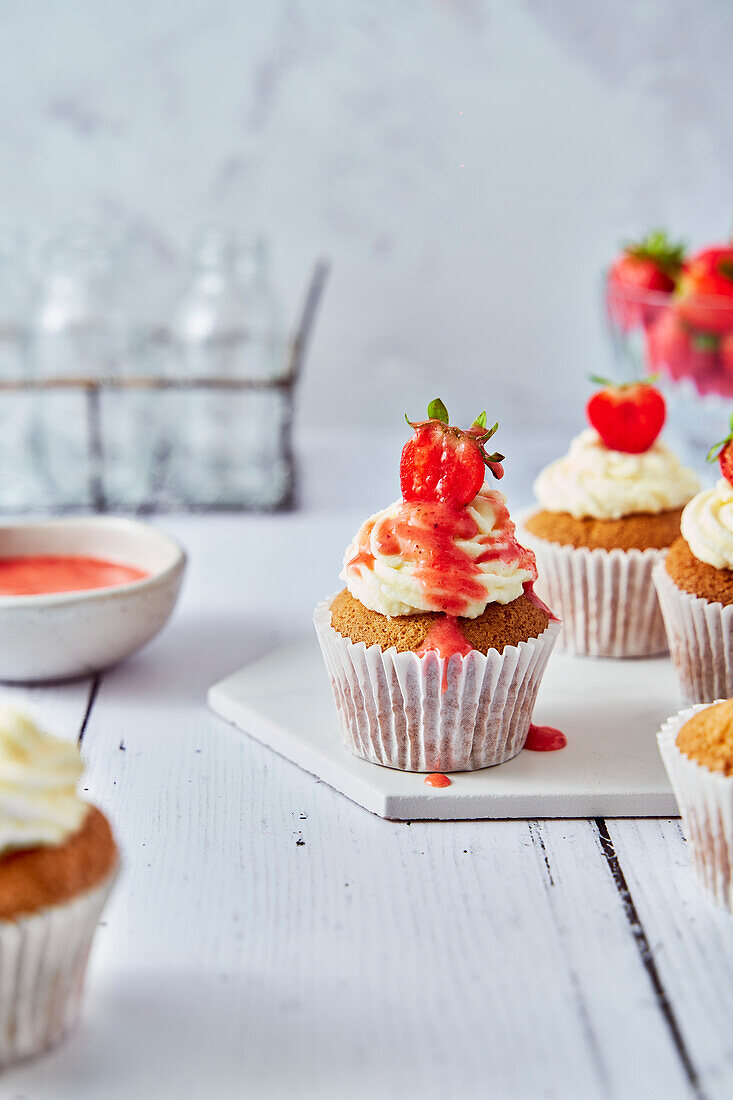 Strawberry Cupcakes with Cream Cheese Frosting and Coulis