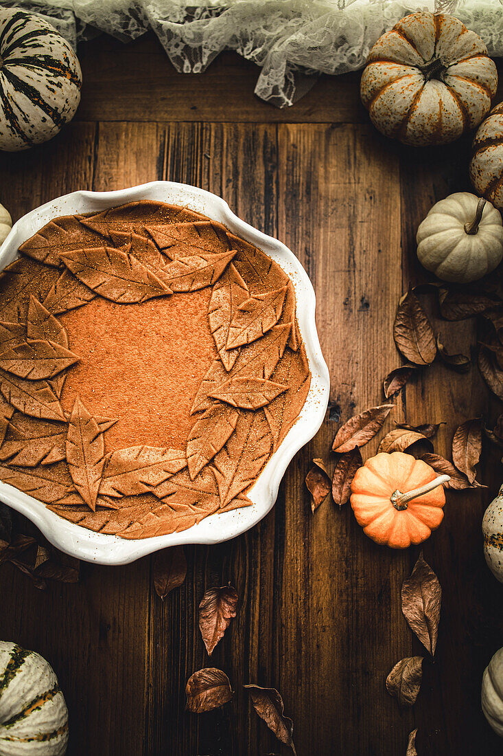 Pumpkin pie in a rustic kitchen