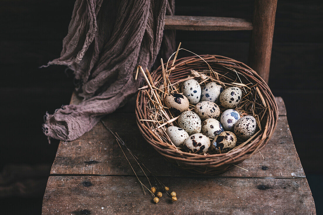 Fresh quail eggs in a basket