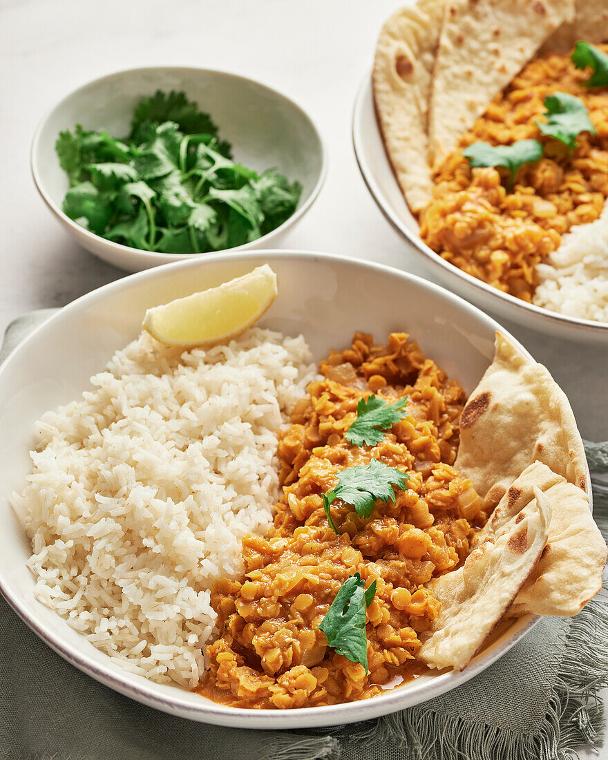Two Bowls of Red Lentil Dahl with Basmati Rice