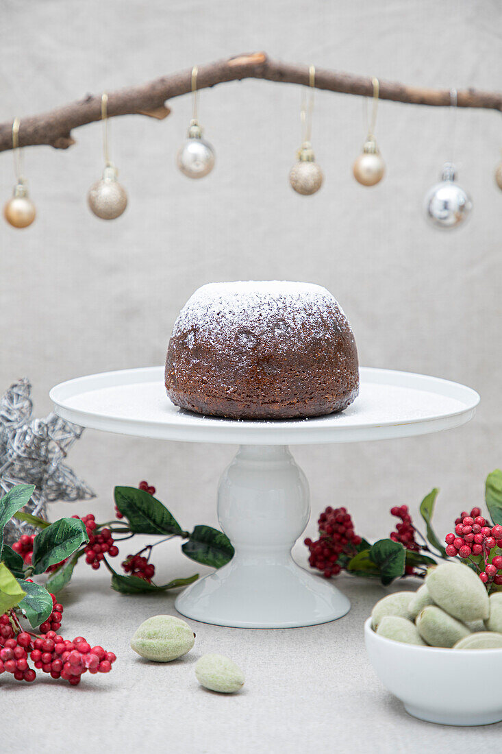 Christmas plum pudding sprinkled with sugar